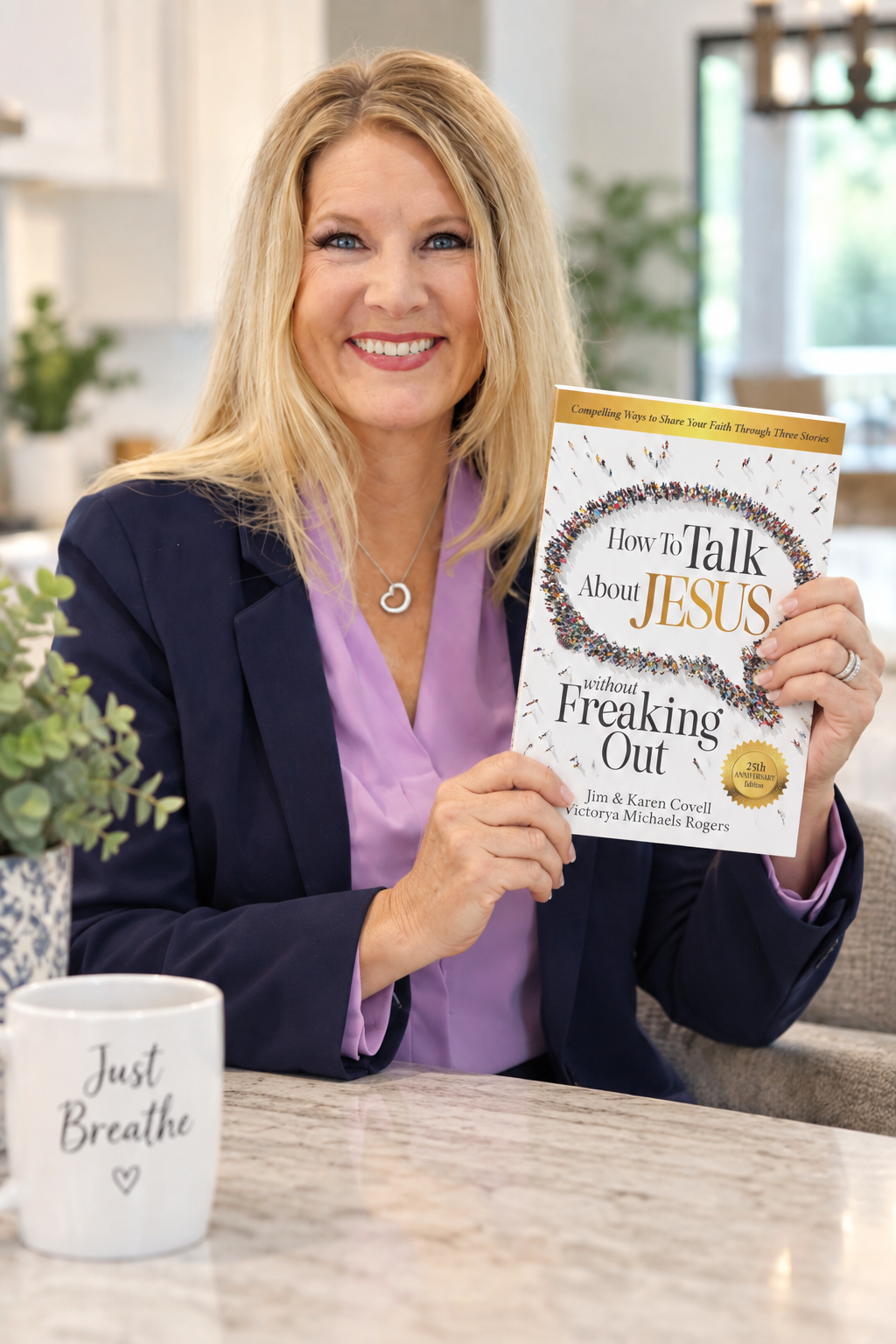 Victorya Rogers holding How to Talk About Jesus Without Freaking Out